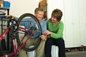 couple repairing bike