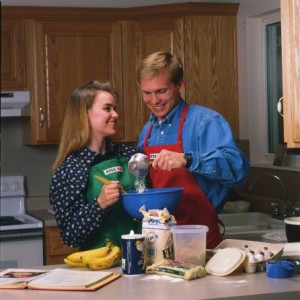 young couple cooking together