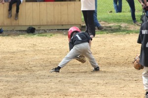 child playing baseball