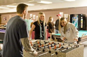 students playing foosball