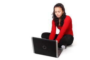 woman typing on computer