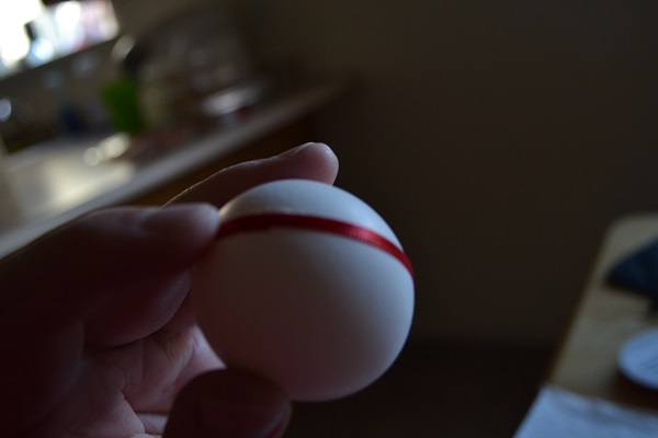 gluing ribbon onto egg shell