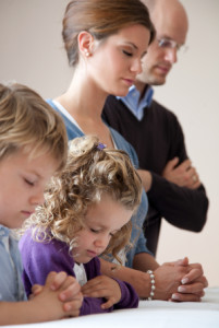 family-kneeling-prayer-889739-gallery