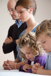 family-kneeling-prayer-889739-gallery