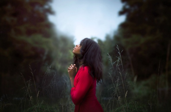 girl praying kneeling