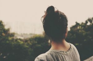 woman pondering thinking overlook