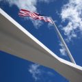 free agency flag flying over the Arizona Memorial
