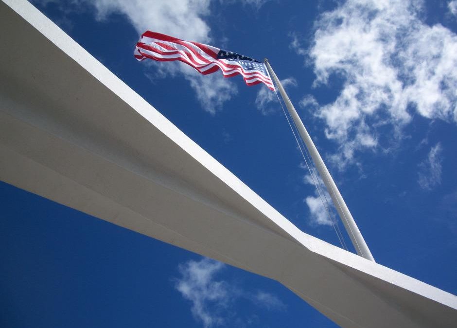 free agency flag flying over the Arizona Memorial
